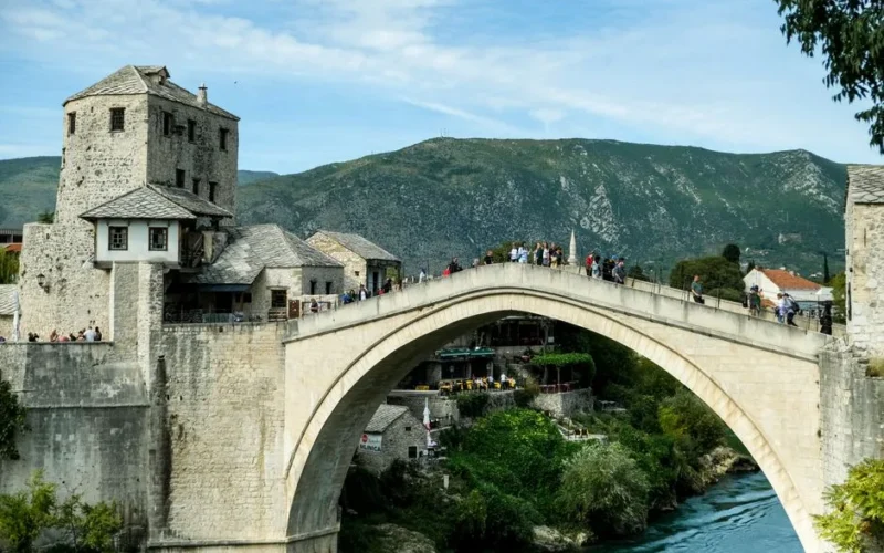 Stari Most, an iconic Ottoman arch bridge in Mostar, Bosnia, over the Neretva River.