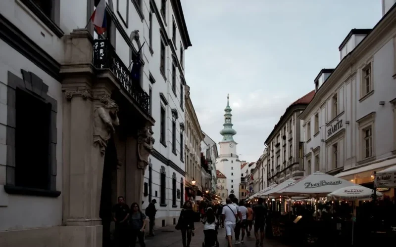 Iconic Michalská Street in Bratislava featuring Michalská Brána and lively European architecture.