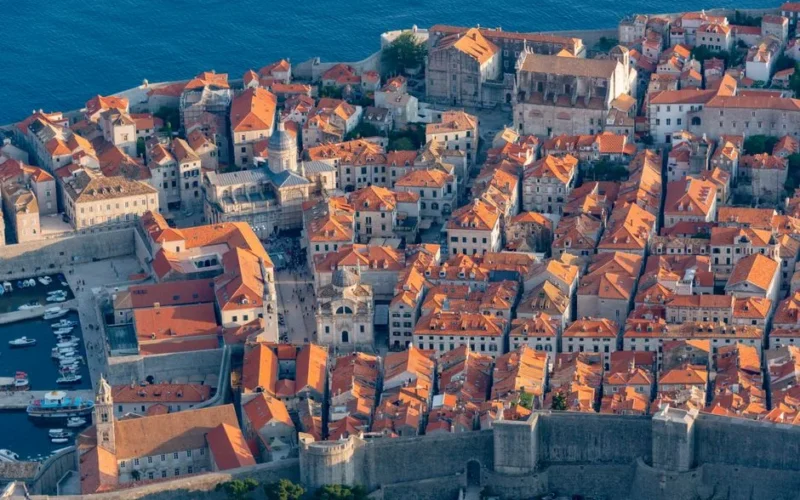 Stunning aerial capture of Dubrovnik's Old Town and majestic Adriatic Sea coastline.