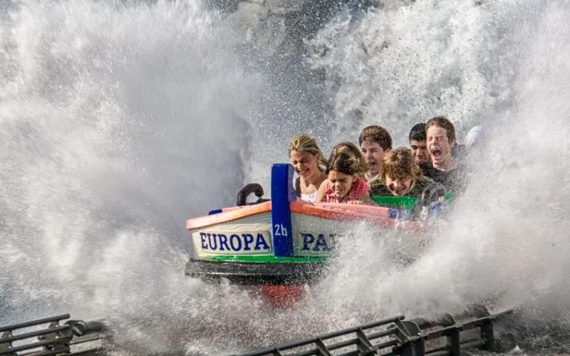 Exciting group splash on a thrilling water ride at Europa Park, capturing joy and adventure.