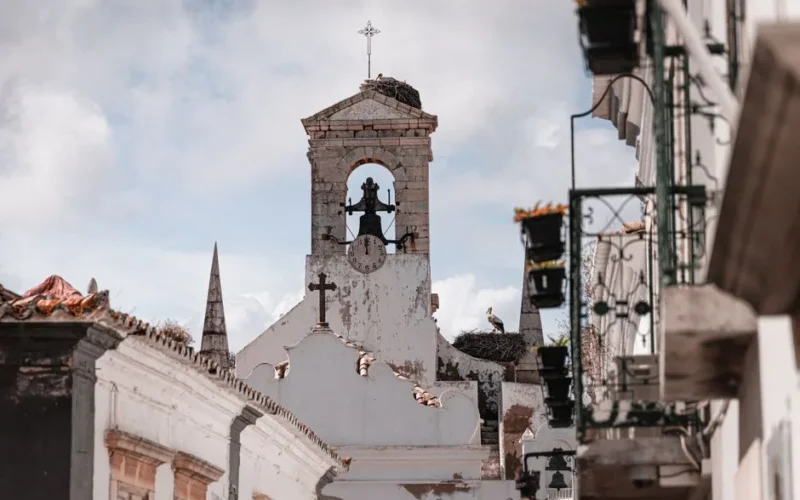A traditional bell tower in Faro, Portugal, capturing architectural charm and cultural essence.