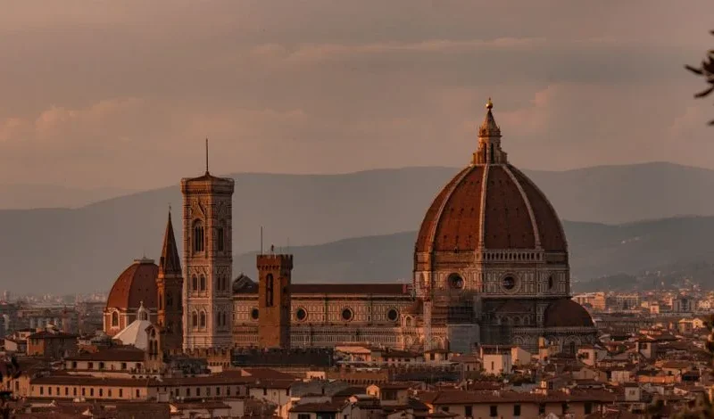 Capture of Florence Cathedral under a warm sunset, highlighting its Renaissance architecture.