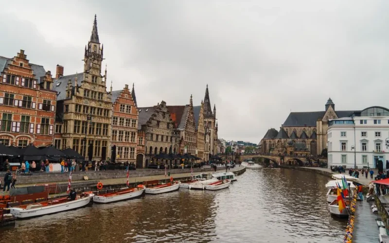 Explore the picturesque medieval architecture and canals of Ghent, Belgium. Perfect for travel enthusiasts.