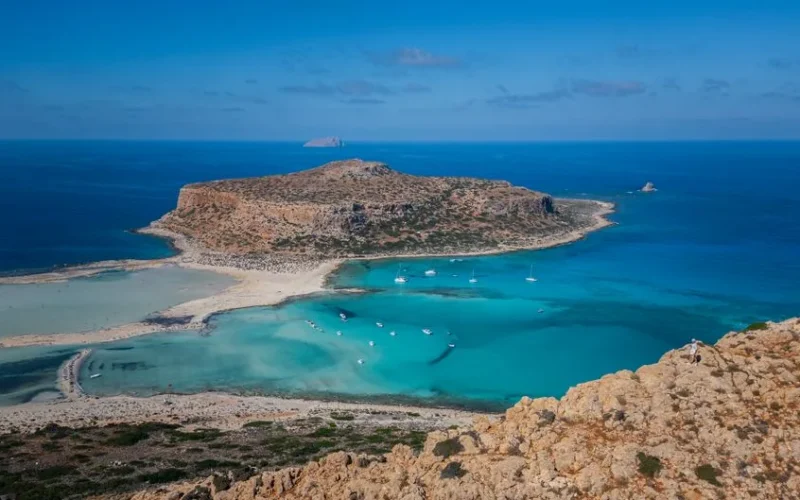 A breathtaking aerial view of Balos Beach in Greece with turquoise waters and sandy shores.