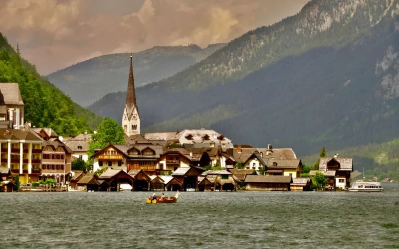 Stunning landscape of Hallstatt village by the lake with mountains in Austria.