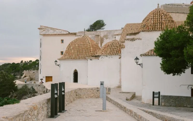 Scenic view of historic white-washed buildings in Ibiza, Balearic Islands, Spain.