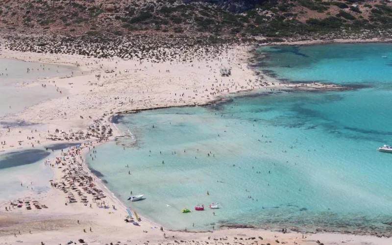 A breathtaking aerial view of Balos Beach in Crete, showcasing its turquoise waters and sandy shores.