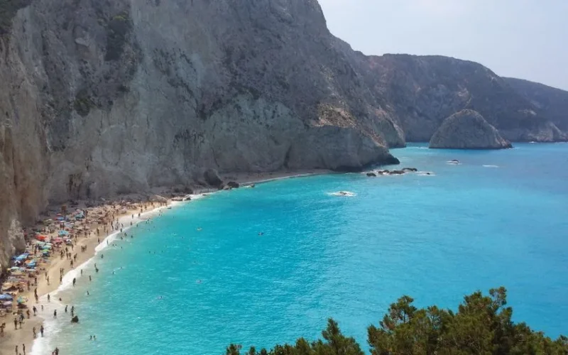 Aerial view of Porto Katsiki Beach with turquoise water and cliffs in Greece.