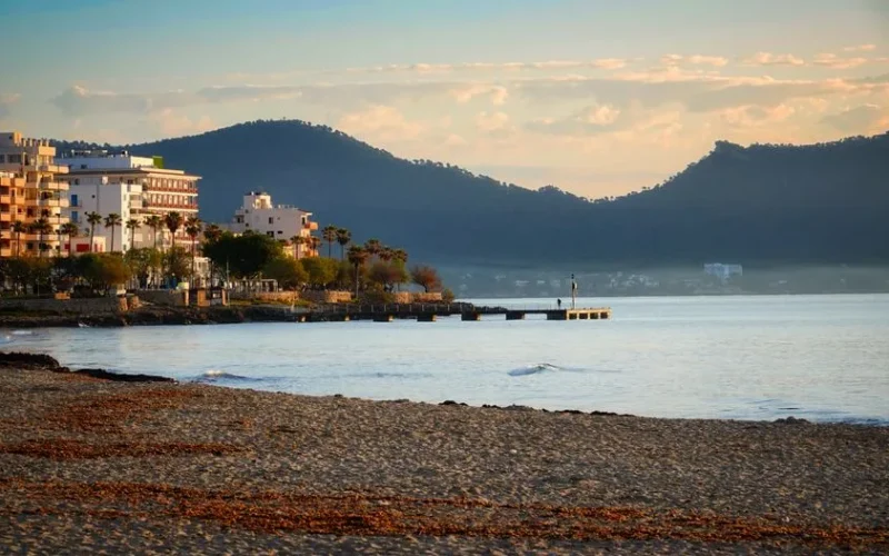 Stunning beach and mountain view at Cala Millor, Mallorca during summer.