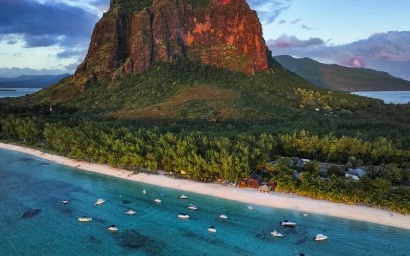 Stunning aerial view showcasing Le Morne Brabant with surrounding beach and boats in Mauritius.