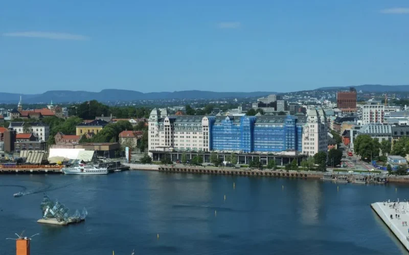 Stunning aerial view of Oslo's waterfront showcasing modern architecture and urban landscape.