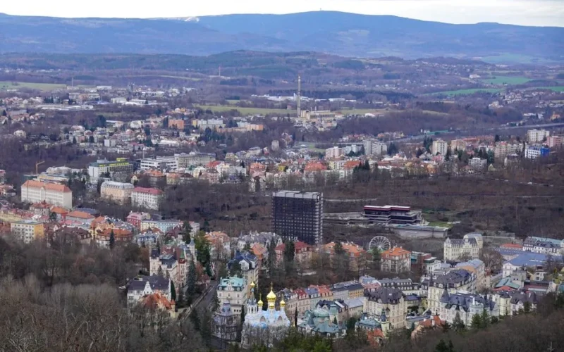 A breathtaking aerial view of Karlovy Vary, Czechia showcasing urban and natural landscapes.