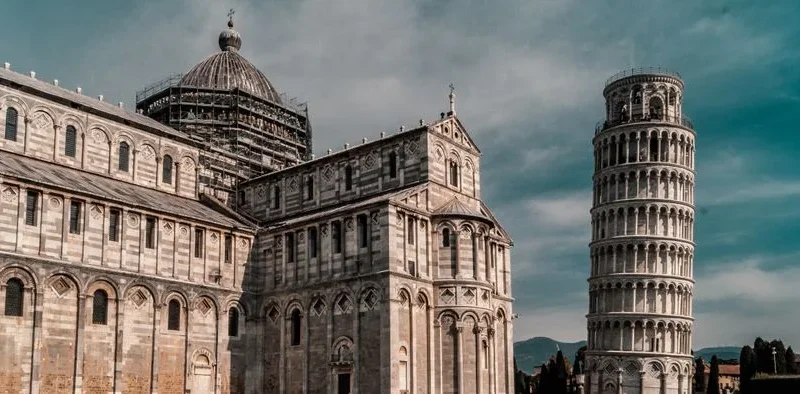 Beautiful view of the Leaning Tower and Pisa Cathedral in sunny Italy.