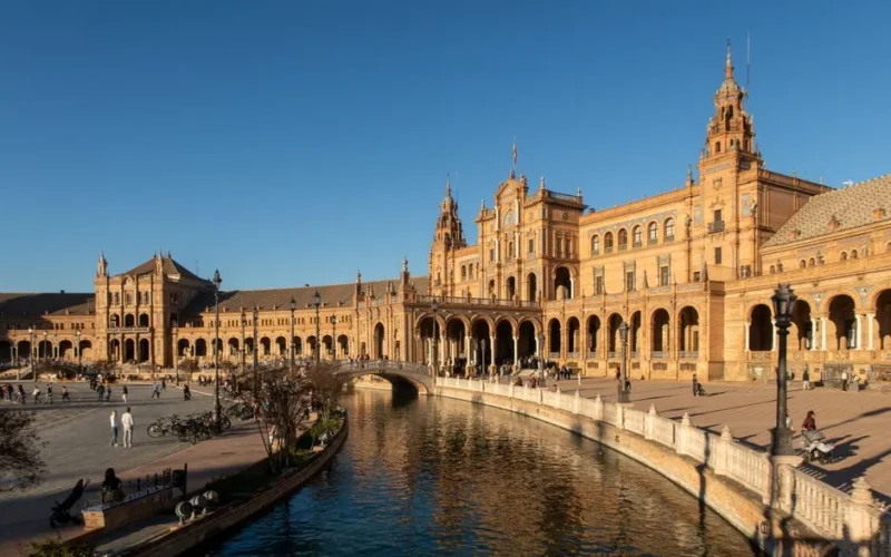 A breathtaking view of Plaza de España in Seville, showcasing its stunning architecture and canal.