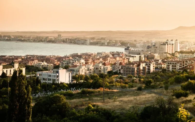 Picturesque view of Sunny Beach, Bulgaria, showcasing coastal cityscape at sunset.