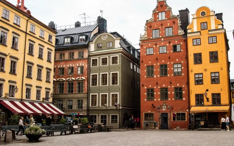 Beautifully preserved historical buildings in Stockholm's Gamla Stan, showcasing iconic Nordic architecture.