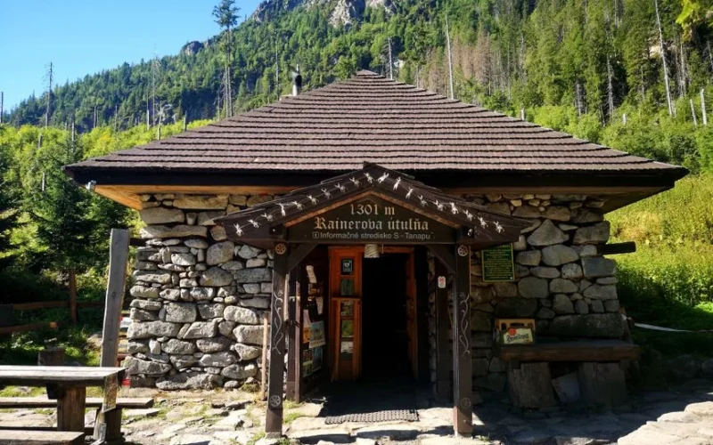 Charming rustic stone cabin nestled in the High Tatra Mountains, a unique travel destination.