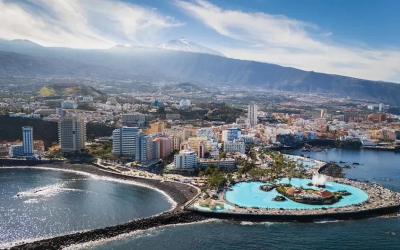 Scenic aerial view of Puerto de la Cruz with Mount Teide in the distance, Tenerife, Canary Islands.