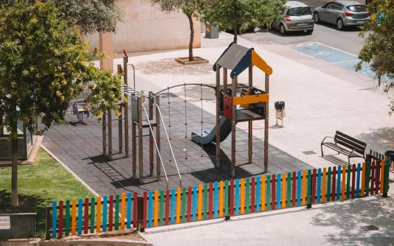 Aerial view of a colorful playground with a slide in Valencia, Spain.