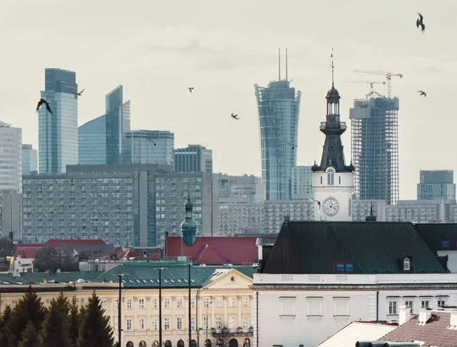 A blend of modern skyscrapers and historical buildings in Warsaw, Poland.