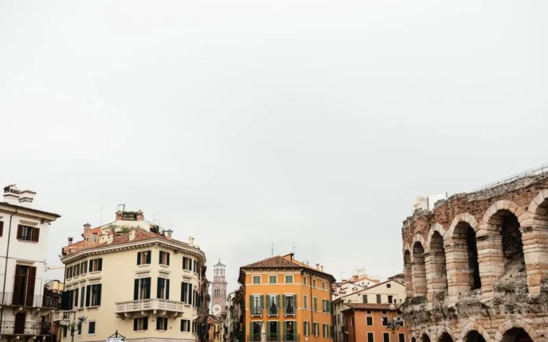 View of Verona's historic buildings and the ancient Roman arena, Italy.